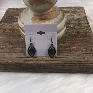 New fashion earrings. Triangle in shape.